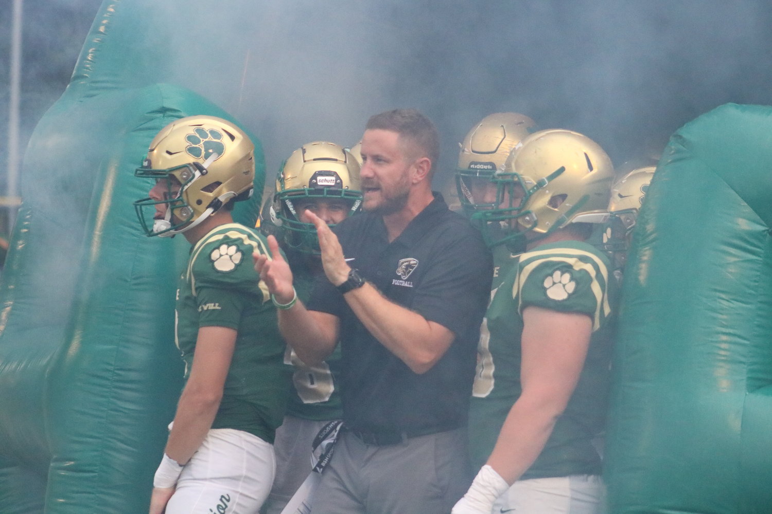 Head coach Collin Drafts and the Nease Panthers prepare to take the field against Fletcher Sept. 16.